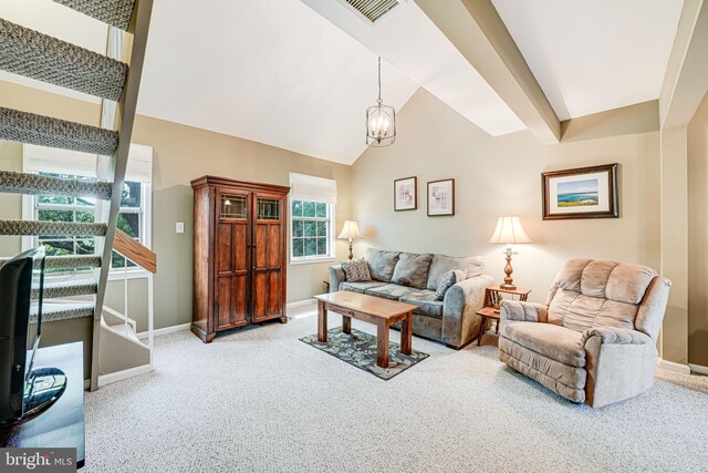 517 Bashford Ln Unit 5, Alexandria, VA 22314 - carpeted living room with baseboards and a chandelier