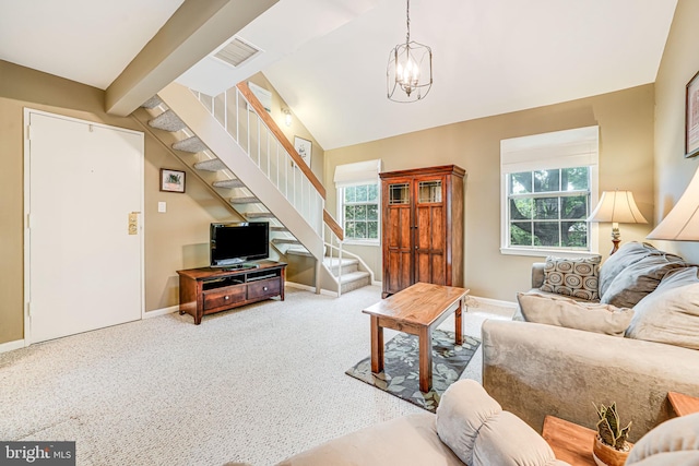 517 Bashford Ln Unit 5, Alexandria, VA 22314 - living room with stairway, a chandelier, carpet floors, and lofted ceiling