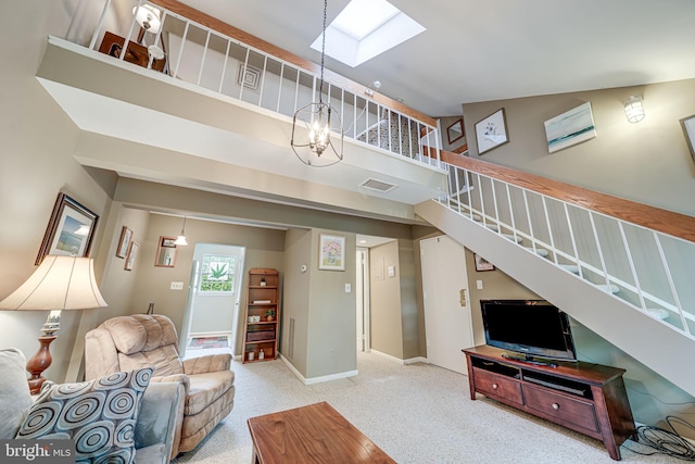 517 Bashford Ln Unit 5, Alexandria, VA 22314 - living room featuring stairs, a skylight, carpet, a chandelier, and a towering ceiling