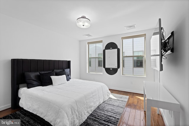 1424 S 4th St, Philadelphia, PA 19147 - bedroom featuring baseboards, visible vents, and dark wood finished floors