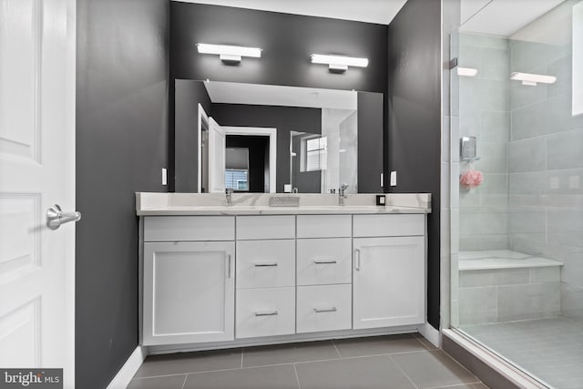 1424 S 4th St, Philadelphia, PA 19147 - bathroom featuring a shower stall, tile patterned flooring, double vanity, and a sink