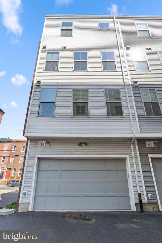 1424 S 4th St, Philadelphia, PA 19147 - view of property featuring an attached garage