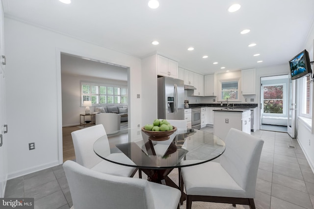 817 Golden Arrow St, Great Falls, VA 22066 - dining area featuring light tile patterned flooring, recessed lighting, and baseboards