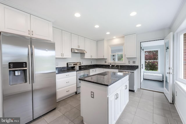 817 Golden Arrow St, Great Falls, VA 22066 - kitchen featuring stainless steel appliances, under cabinet range hood, a sink, a center island, and light tile patterned floors