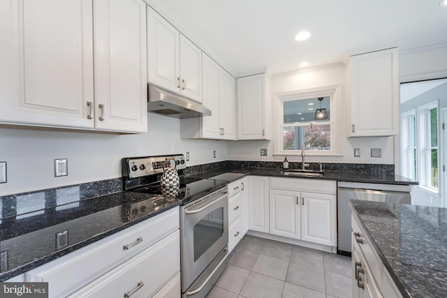 817 Golden Arrow St, Great Falls, VA 22066 - kitchen featuring stainless steel appliances, under cabinet range hood, a sink, white cabinets, and recessed lighting