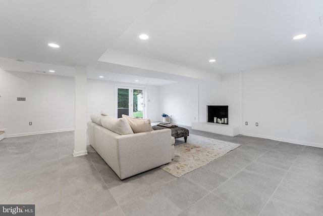 817 Golden Arrow St, Great Falls, VA 22066 - living room with recessed lighting, light tile patterned floors, and baseboards