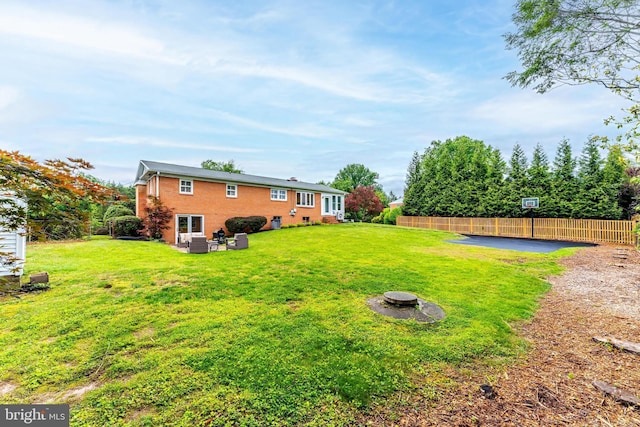 817 Golden Arrow St, Great Falls, VA 22066 - view of yard featuring an outdoor fire pit