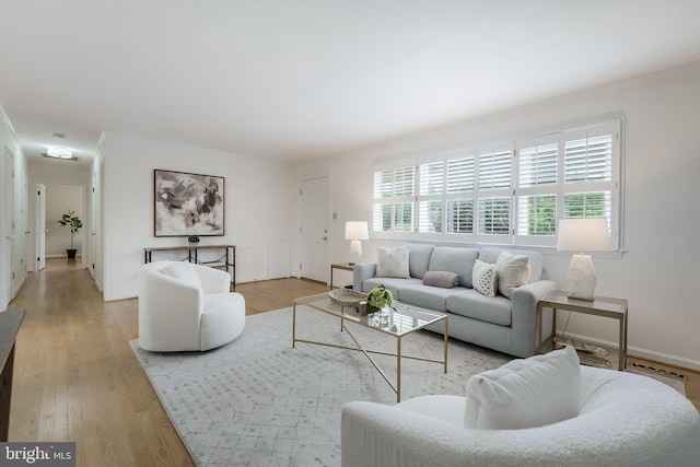 817 Golden Arrow St, Great Falls, VA 22066 - living room featuring light wood finished floors and baseboards
