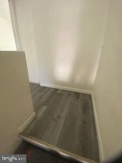 1047 W Nevada St, Philadelphia, PA 19133 - room details with baseboards and wood finished floors