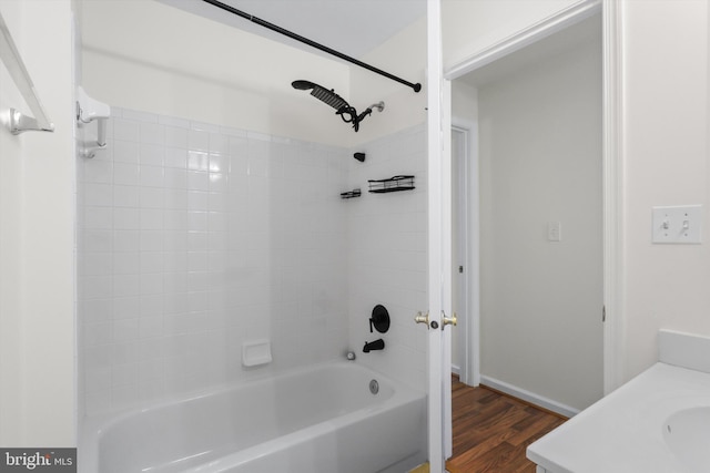 11014 Koman Cir Unit 304, Manassas, VA 20109 - full bath with wood finished floors, baseboards, and shower / washtub combination