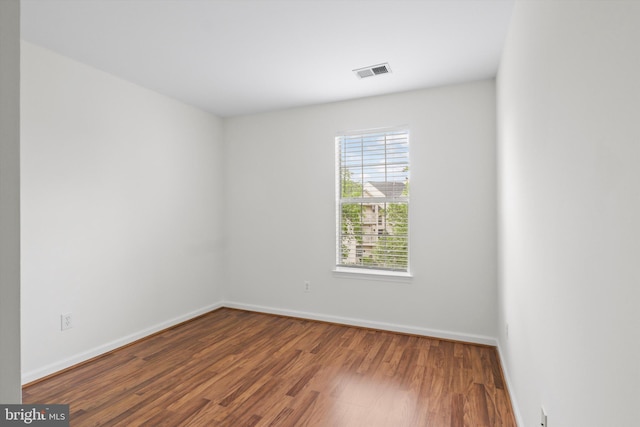 11014 Koman Cir Unit 304, Manassas, VA 20109 - spare room with baseboards, visible vents, and wood finished floors