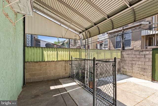 view of patio / terrace with fence and a gate