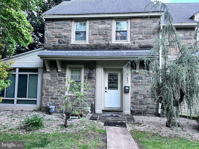 547 Baeder Rd, Jenkintown, PA 19046 - view of front facade featuring stone siding and roof with shingles