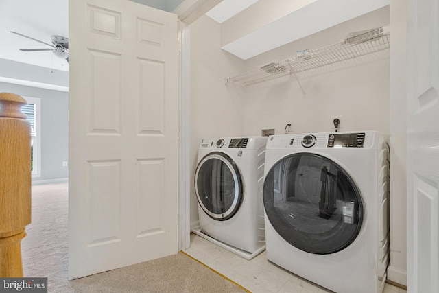 washroom featuring ceiling fan, laundry area, and washer and dryer