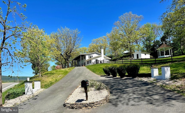 view of road with aphalt driveway