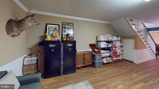 additional living space with stairway and wood finished floors
