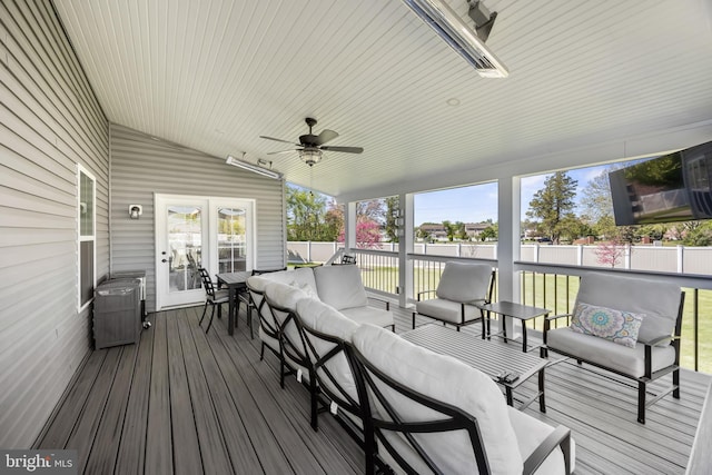 deck with ceiling fan and outdoor lounge area