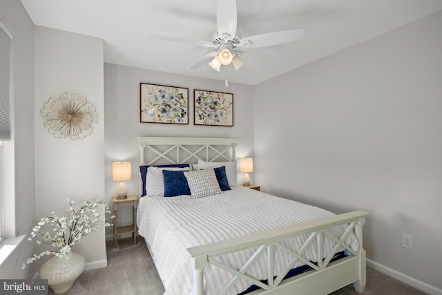 bedroom featuring carpet floors, baseboards, and ceiling fan