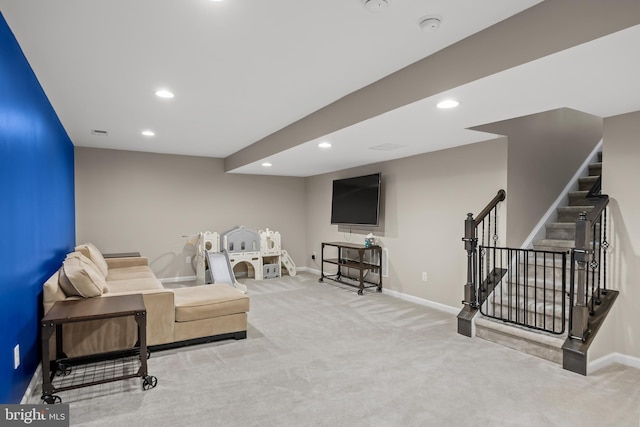 carpeted living area featuring baseboards, recessed lighting, visible vents, and stairway