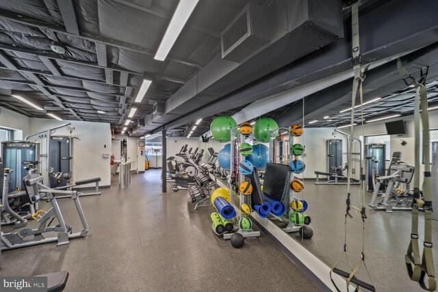 exercise room featuring visible vents