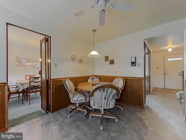 2422 Pinefield Rd, Waldorf, MD 20601 - dining room featuring ceiling fan, wood walls, and wainscoting
