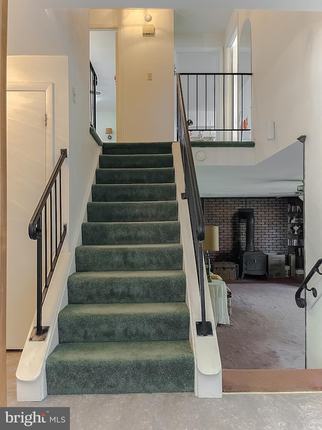 2422 Pinefield Rd, Waldorf, MD 20601 - stairway featuring a high ceiling and a wood stove