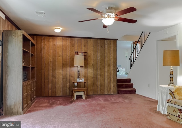 2422 Pinefield Rd, Waldorf, MD 20601 - living area featuring carpet, stairs, and wooden walls