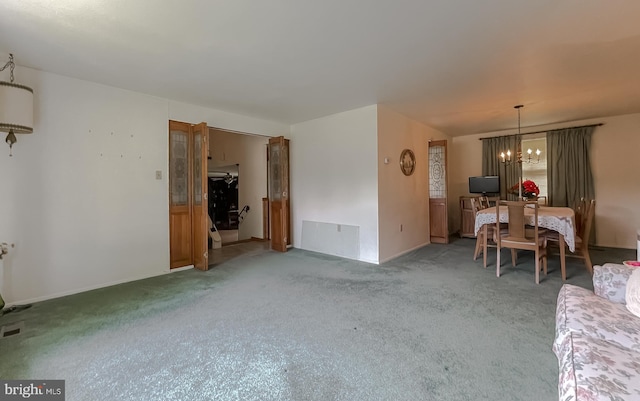 2422 Pinefield Rd, Waldorf, MD 20601 - living room featuring baseboards, a chandelier, and light carpet