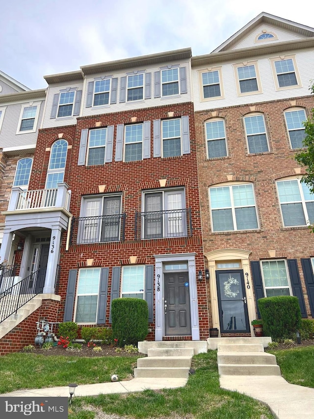 multi unit property with brick siding