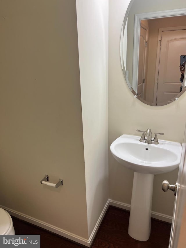 bathroom featuring baseboards