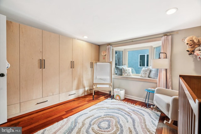 sitting room featuring recessed lighting and wood finished floors