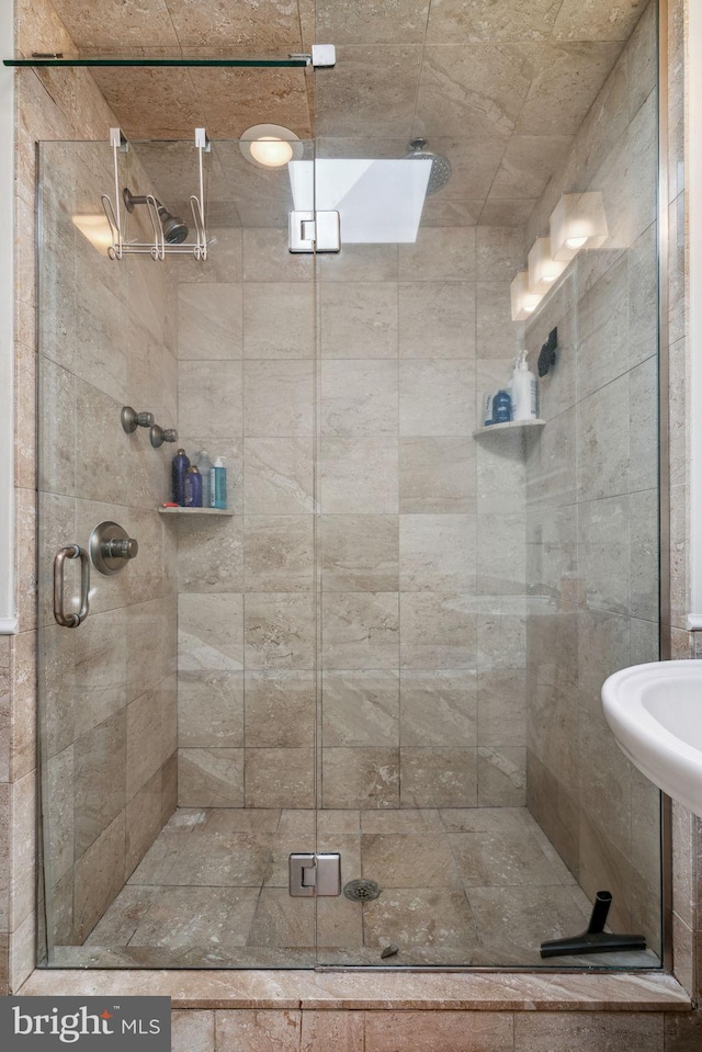 full bathroom with a stall shower