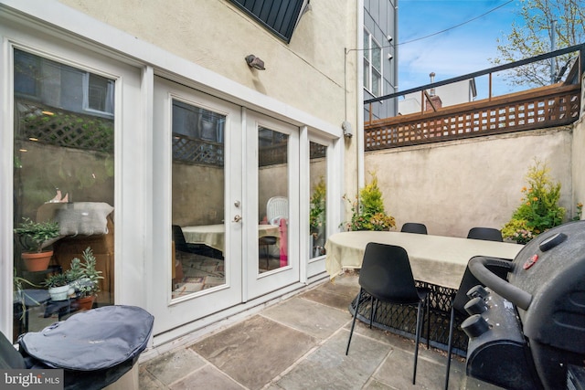 view of patio / terrace featuring french doors and grilling area