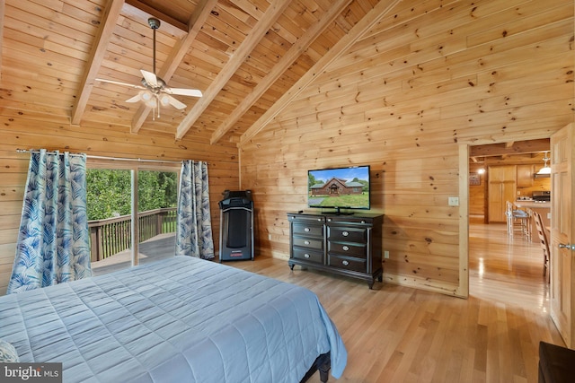 bedroom featuring wood walls, wood finished floors, beamed ceiling, access to exterior, and wood ceiling