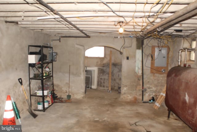 below grade area featuring electric panel and heating fuel