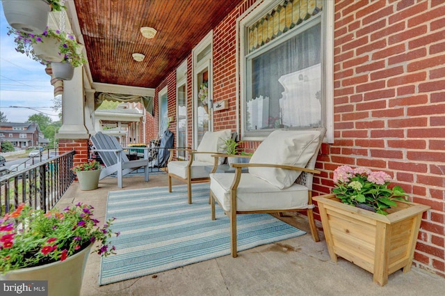 balcony featuring a porch