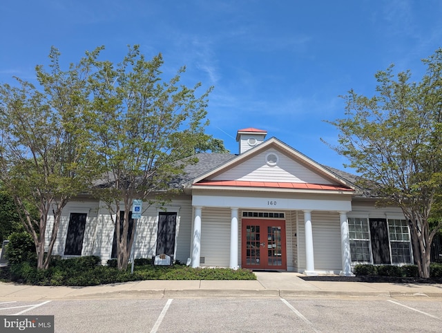 8004 Ink Berry Ct Unit D-3, Pasadena, MD 21122 - view of building exterior featuring uncovered parking