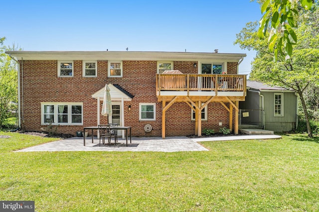 4001 Patricia St, Annandale, VA 22003 - rear view of property featuring a lawn, a patio, and brick siding