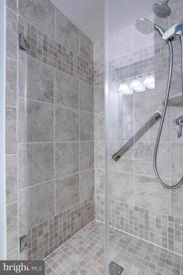 bathroom featuring a stall shower