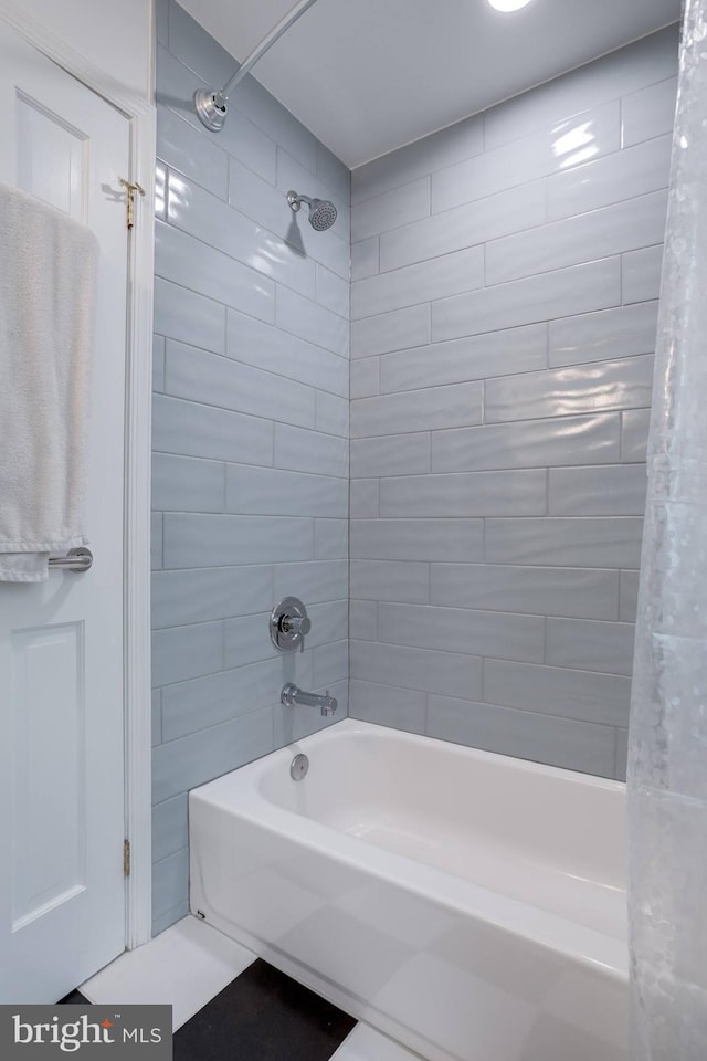 full bathroom featuring shower / tub combo