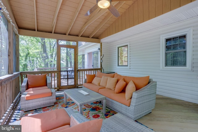 sunroom with an outdoor hangout area, a ceiling fan, and beamed ceiling