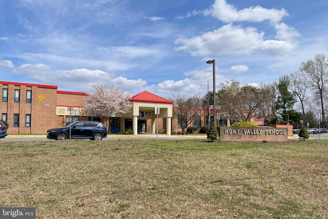 view of community with a lawn