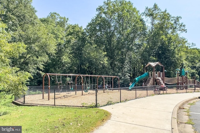 community jungle gym with fence