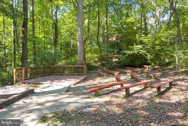 surrounding community with a wooded view