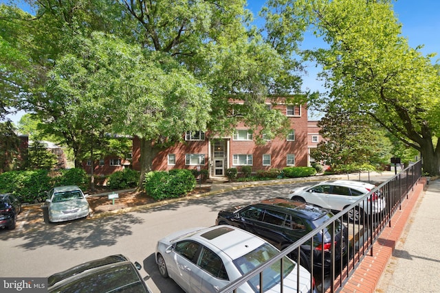 townhome / multi-family property with uncovered parking