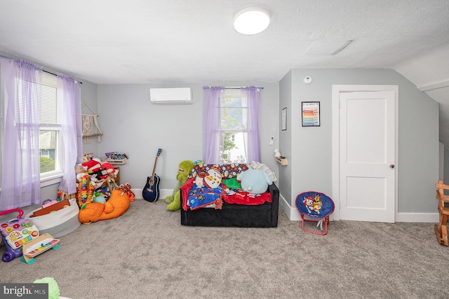 rec room with carpet flooring, a wall unit AC, and a wealth of natural light
