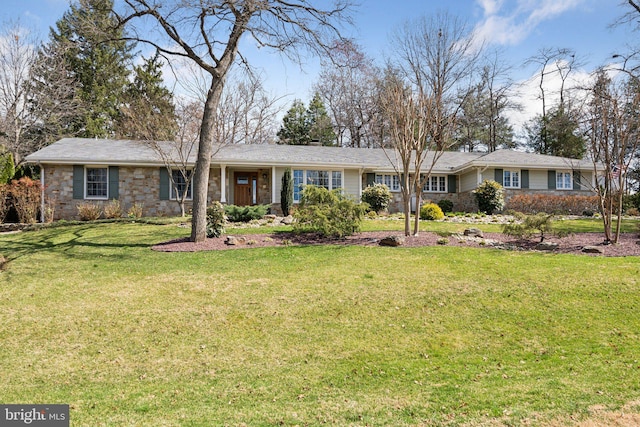 single story home with a chimney and a front yard