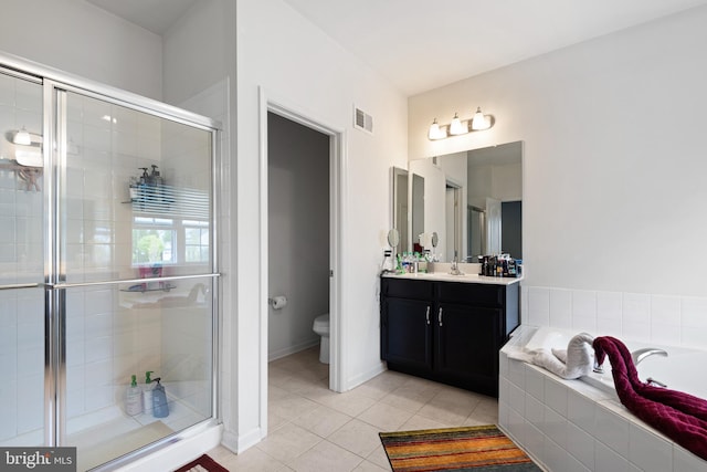 full bath with tile patterned flooring, vanity, toilet, visible vents, and a stall shower