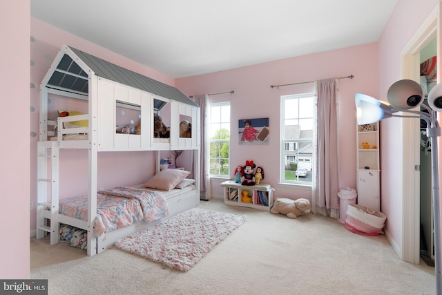 bedroom with light carpet