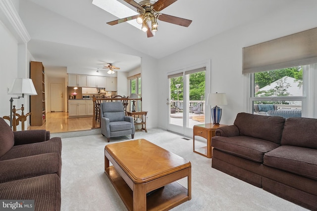 9116 John Way, Fairfax Station, VA 22039 - living area with light colored carpet, ceiling fan, healthy amount of natural light, and vaulted ceiling